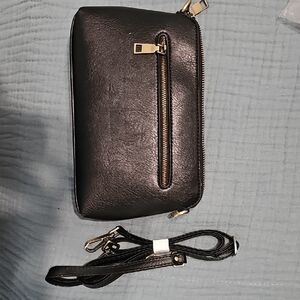 Black Crossbody Bag with Gold Accents 9inches x 6 inches has 2 straps